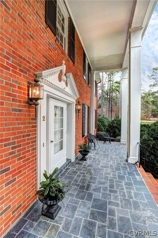 Vast Front Porch Running the Length of the Home