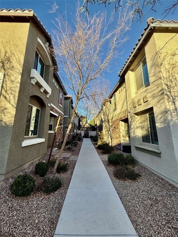 View of property's community featuring a patio