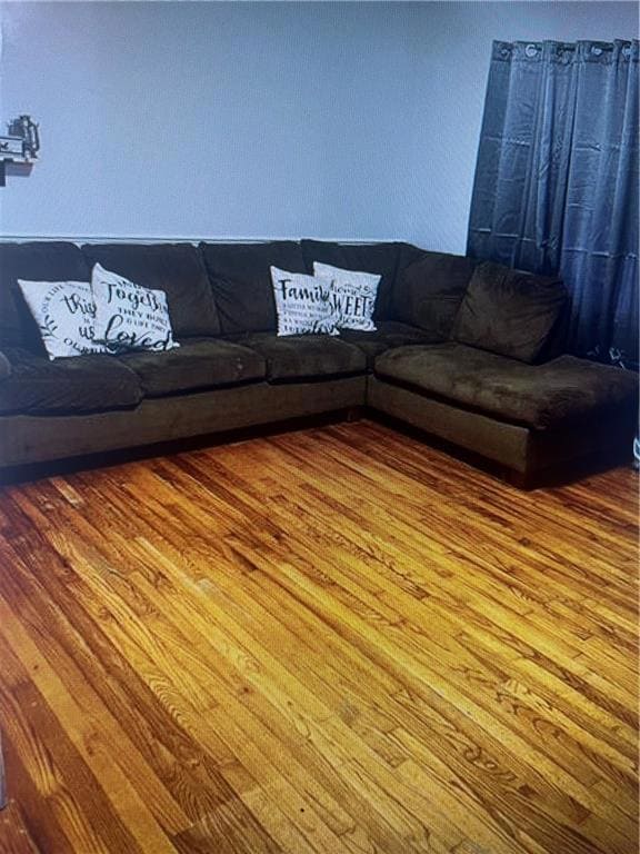 Living room featuring wood finished floors