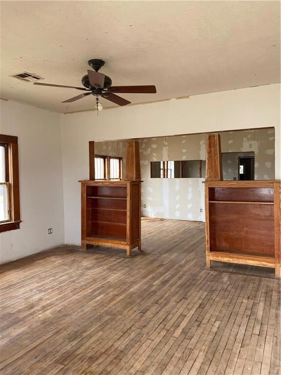 View of living room into dining from front door