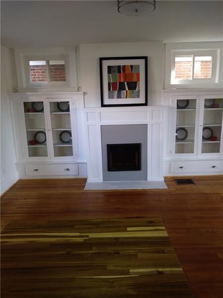 Dining room w/matching fireplace & built-in cabine