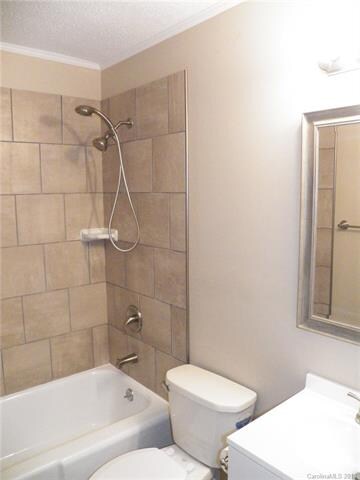 UPDATED MAIN BATH WITH TILE SURROUND