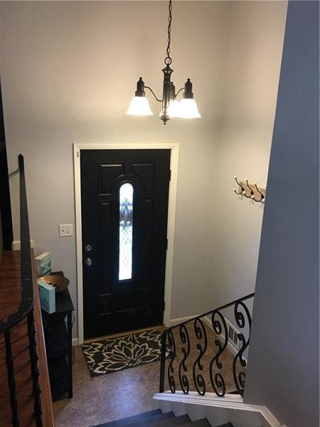 Welcoming entry way with iron railings, newer floo
