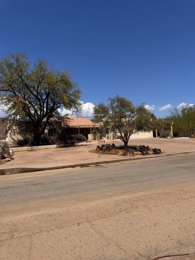 Front exterior with yard on 0.39 acre lot