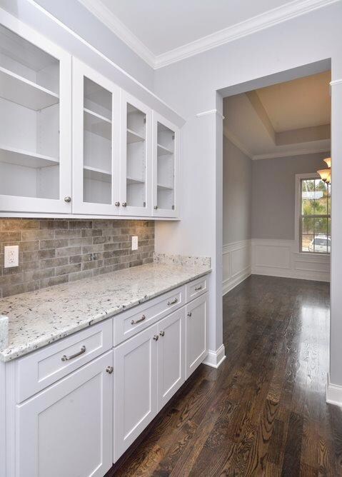 Butler's Pantry  Photo is an Augusta II in a different Community. For representation only.