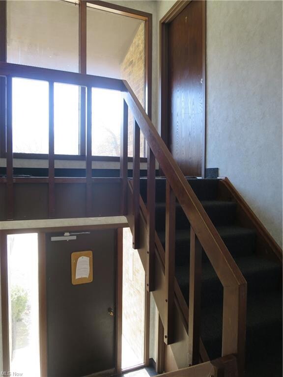 Entrance stairs to second floor unit.