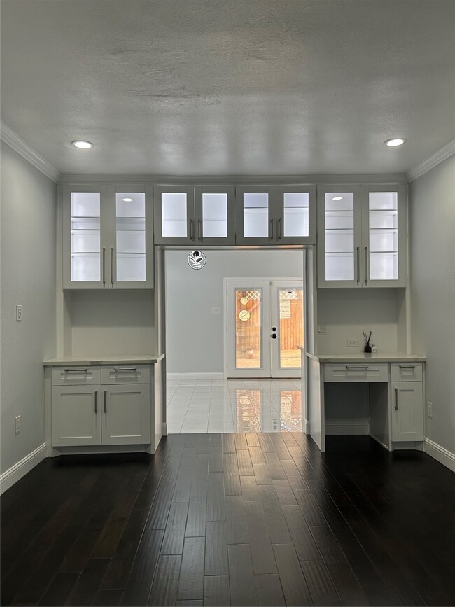 Enjoy a view of the family room into the bright, modern breakfast room and kitchen.