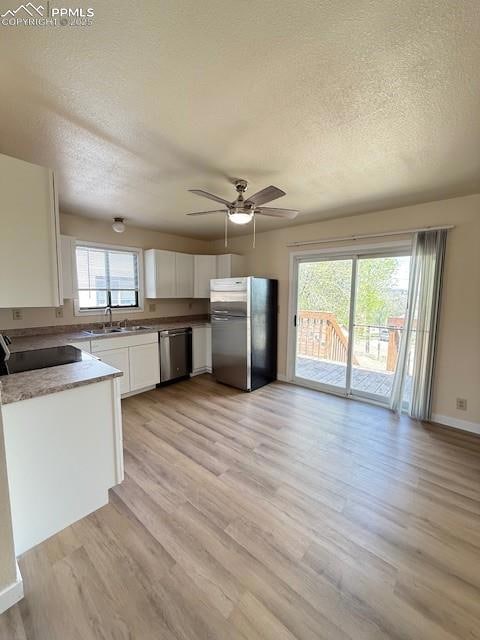 Kitchen with appliances with stainless steel finis
