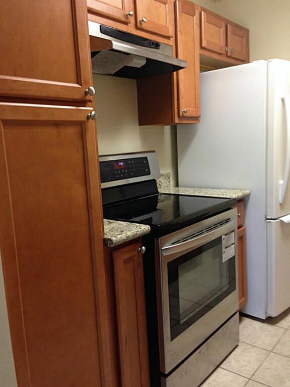 Updated cabinets. Refrigerator is included