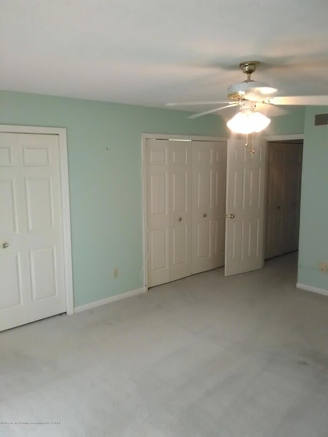 Master bedroom with his/her closets