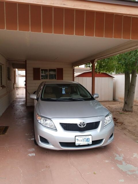 Carport,laundry behind