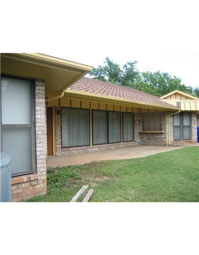 Exterior Back. Open and covered patio.