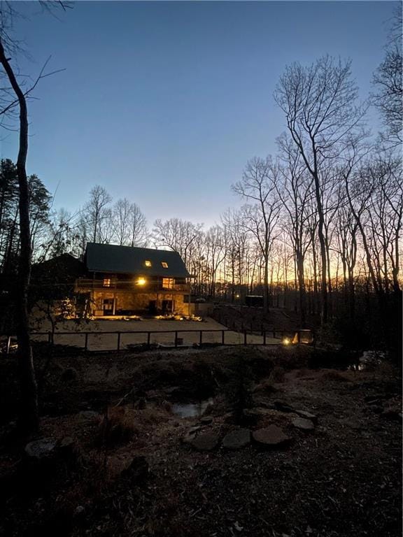 View of yard at dusk