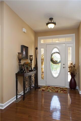 Your true formal entry foyer with hardwoods will welcome your guests to this amazing home.