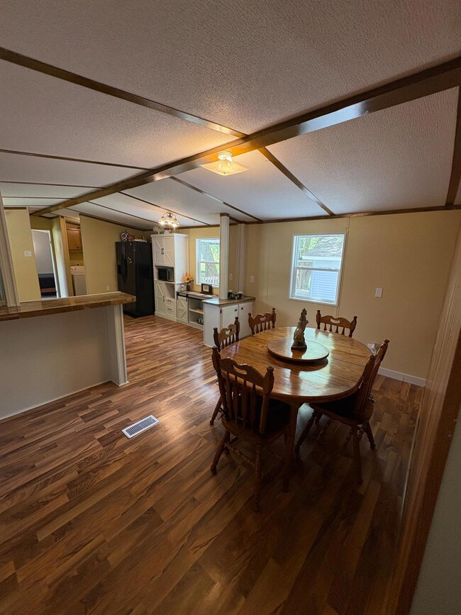 Dining area is spacious, with plenty of room for all your gatherings. Table can be included; it seats 6 comfortably.
