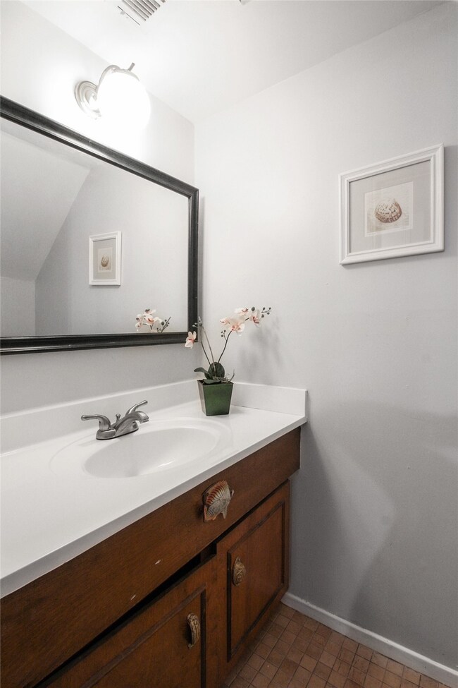 half bathroom conveniently located downstairs