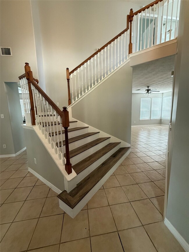 Entry, to the left is the formal dining area, to t