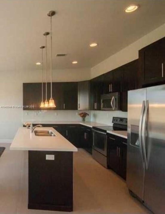 Stainless Steel Appliances, White Quartz Counterto