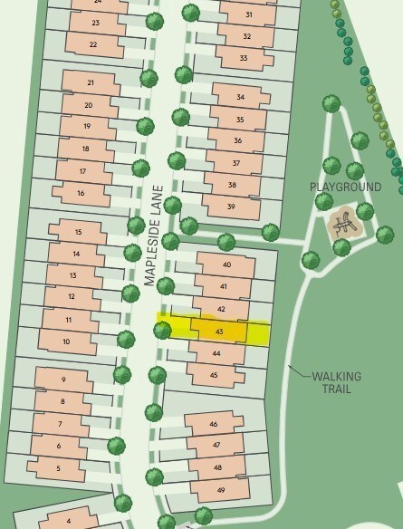 This townhouse is located on a private homesite that overlooks the walking trail and community playground/green space!