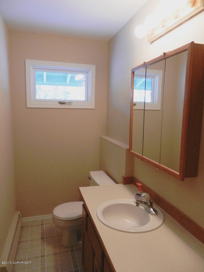 Half Bath near entry, plumbed for shower