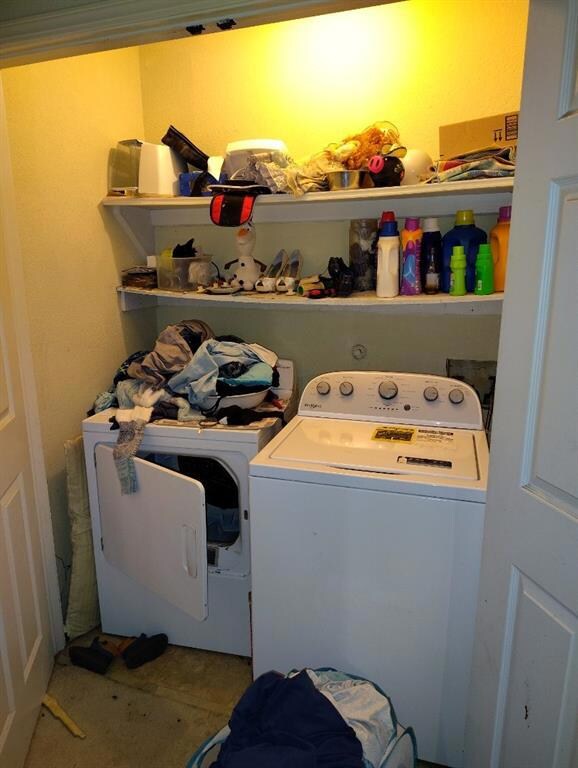 Laundry area featuring independent washer and drye