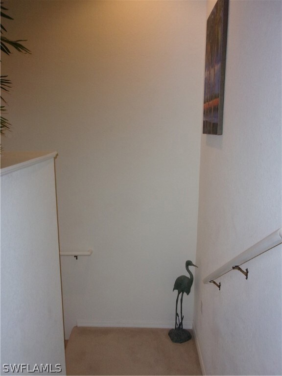 Up the stairs with l-landing and into the home!