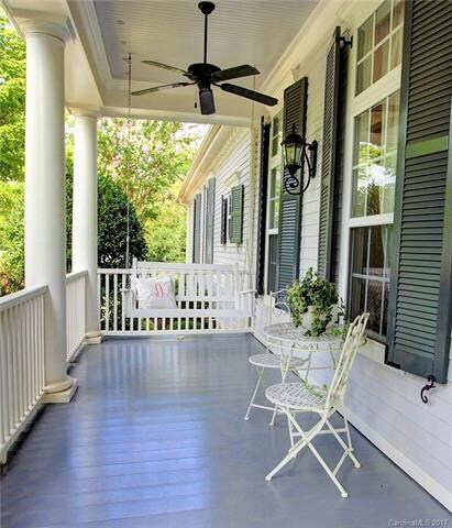 Inviting front porch calls for a neighborly hello.
