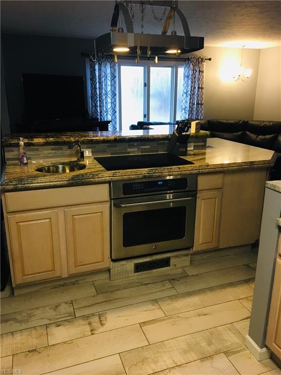 Gorgeous island with extra sink and additional cab