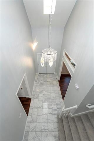 Vaulted ceilings in foyer and family room.