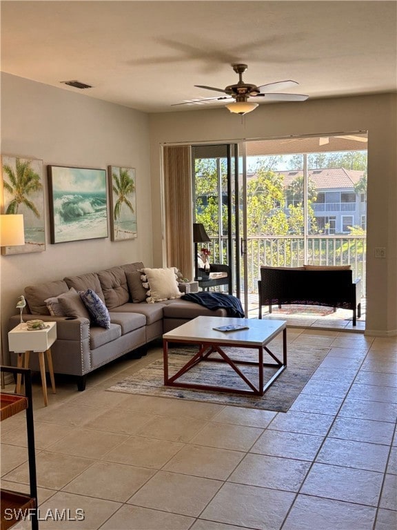 Living room with tile flooring leads has a triple