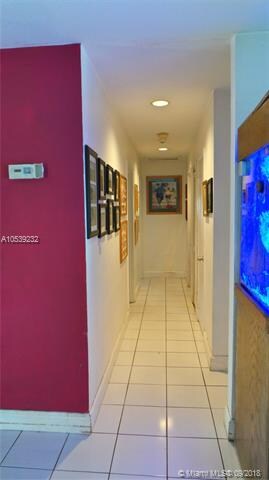 hallway to the right of entryway to the 3 bedrooms