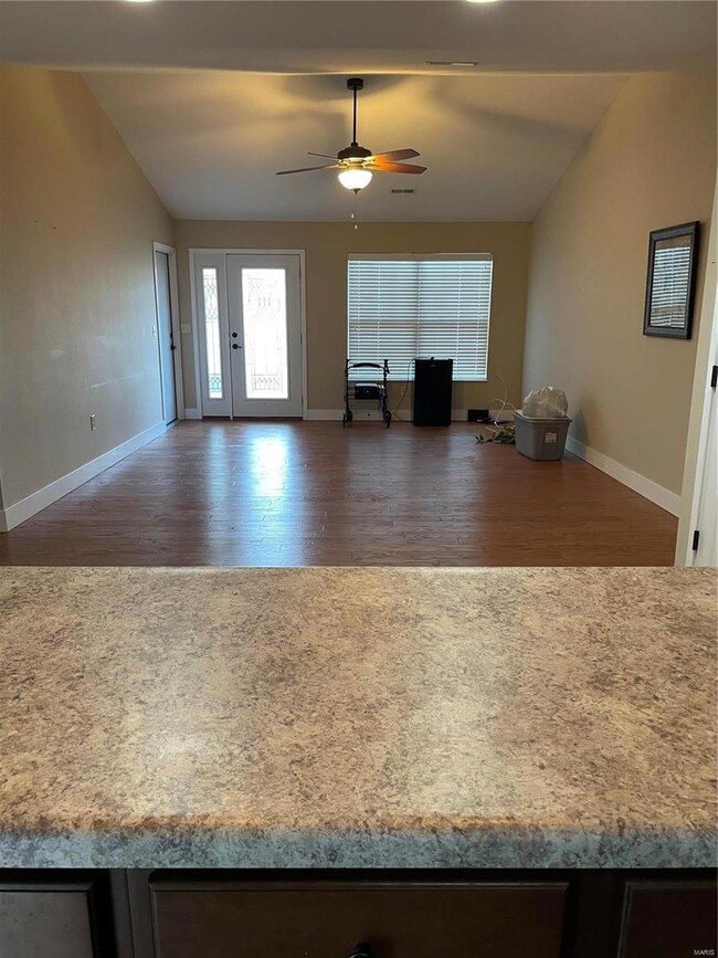 view from kitchen island to the great room