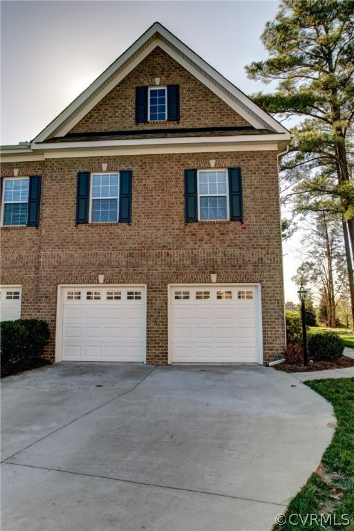2 CAR GARAGE, PAVED DRIVEWAY, MAINTENANCE FREE YAR