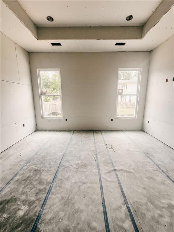 Master Bedroom with windows & tray ceiling.