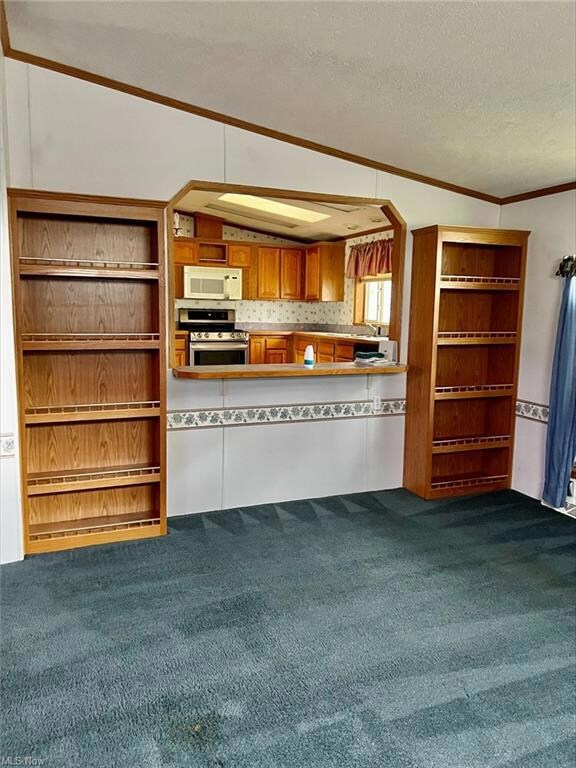 in the livingroom looking into kitchen