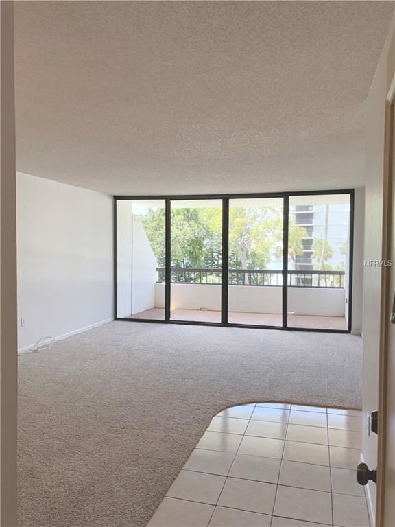 Entry to condo. Dining/Living room area looking ou