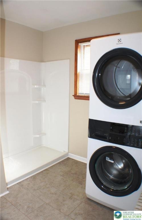 Apartment has just been updated, here are new shower surround and stackable laundry