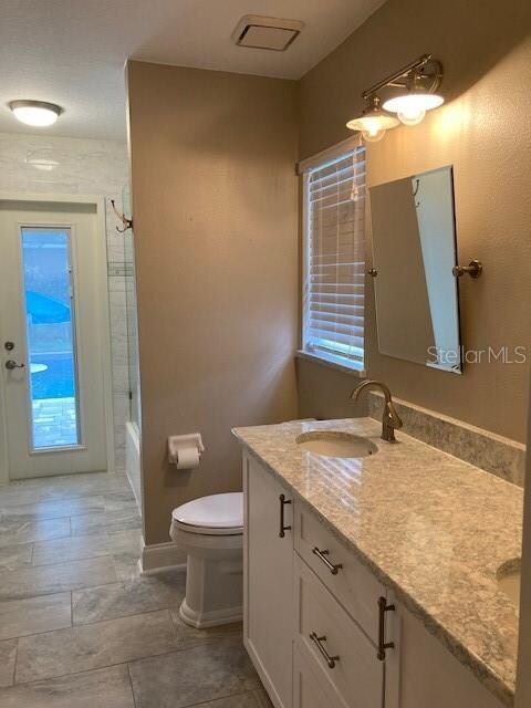 Bathroom 2 with access to pool area