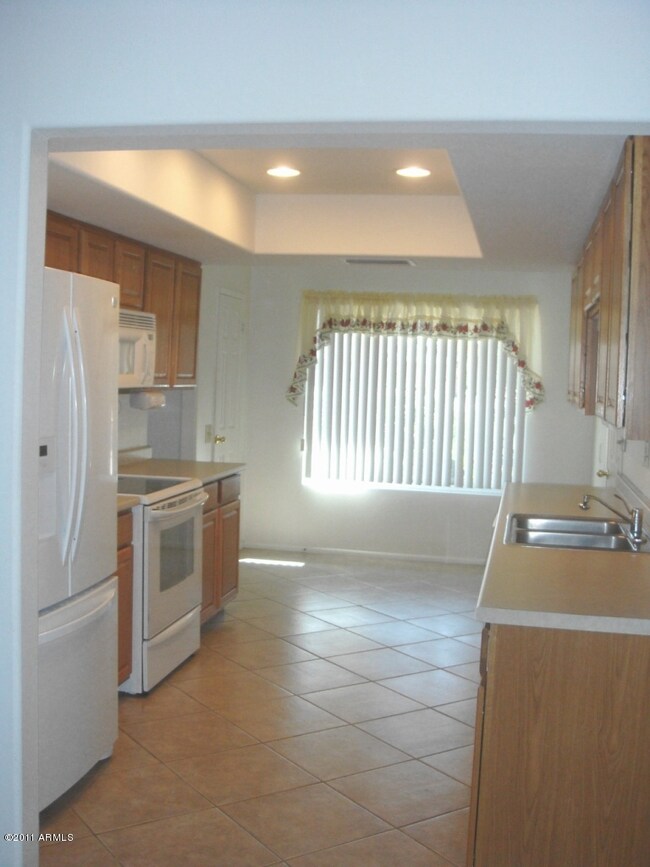 KITCHEN LOOKING TO BREAKFAST NOOK
