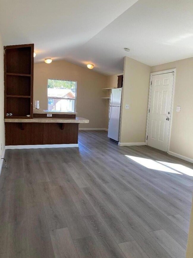 Open concept kitchen/living room with a breakfast 