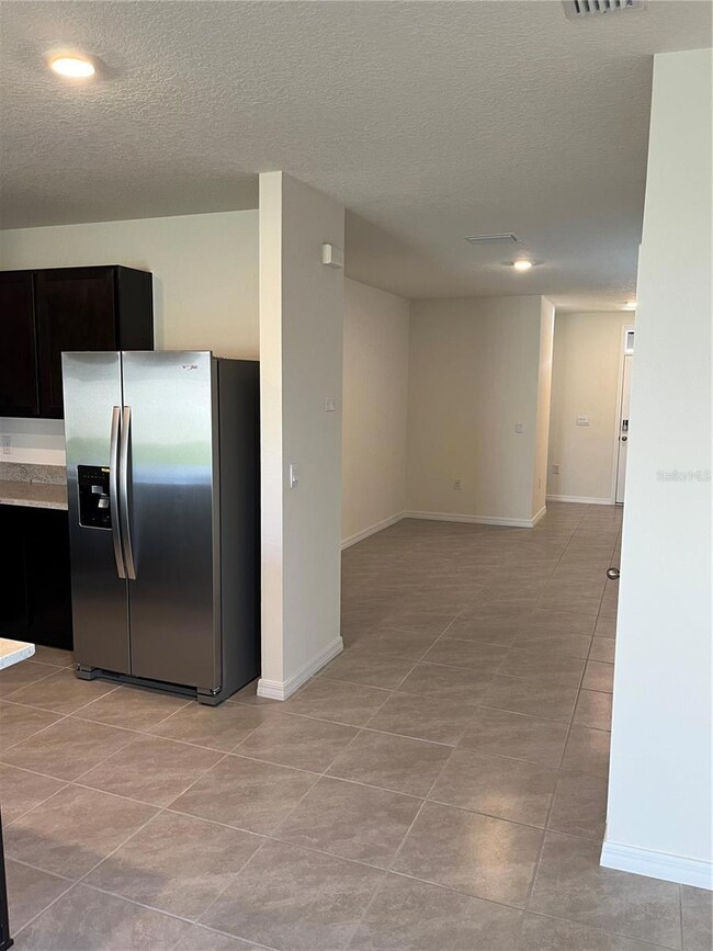 9302 Forge Breeze Loop, Wesley Chapel, FL 33545 - photo 7