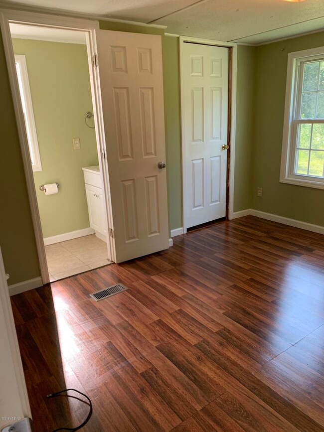Bedroom with half bath