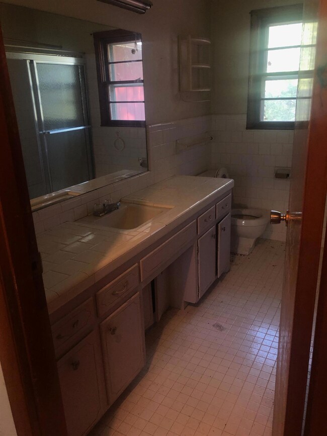 $10,000 Down Day of Sale.  10% Is added to final bid to determine sales price.  Balance due in 30 days.