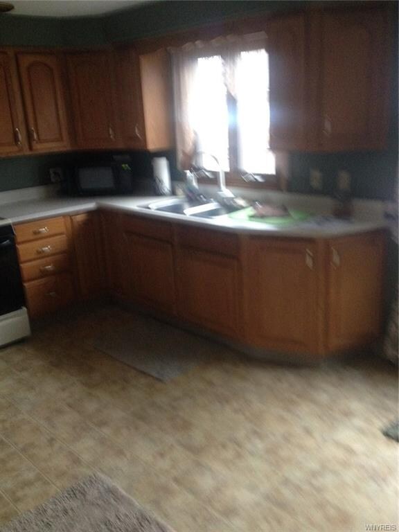 Lower Eat-in Kitchen with plenty of cabinet space