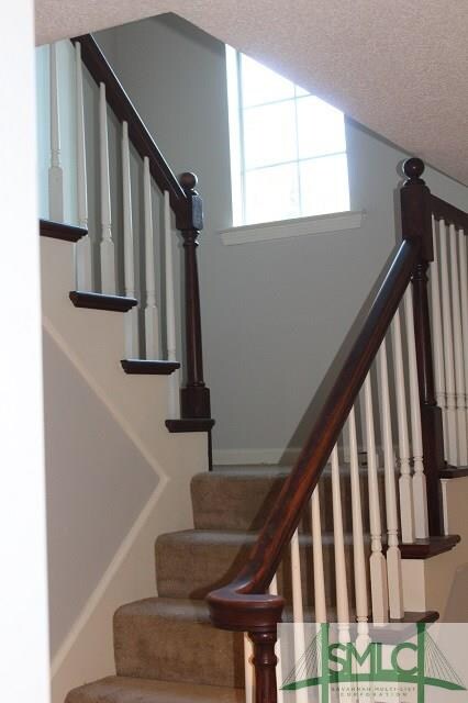 Front Hall, 2 Story with cathedral window on landi