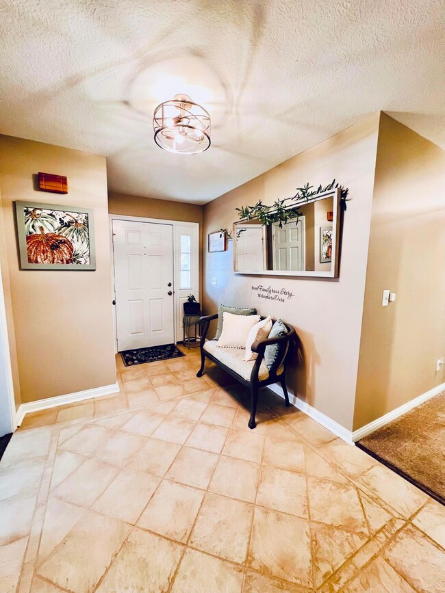 Foyer with ceramic tile