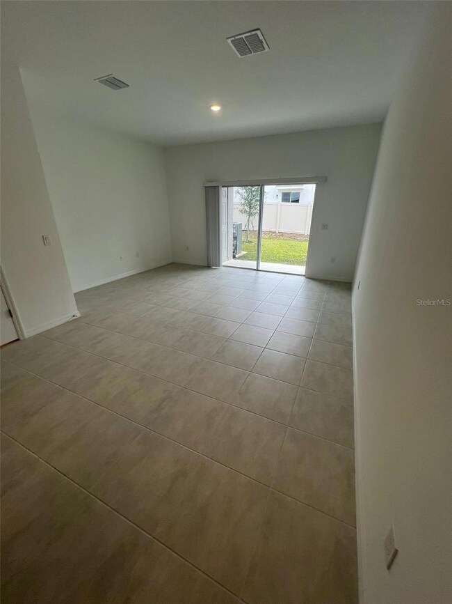 3128 Skyline Loop, Kissimmee, FL 34758 - photo 4