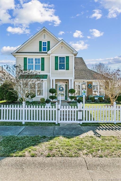 A single family home on a white picket fence-lined