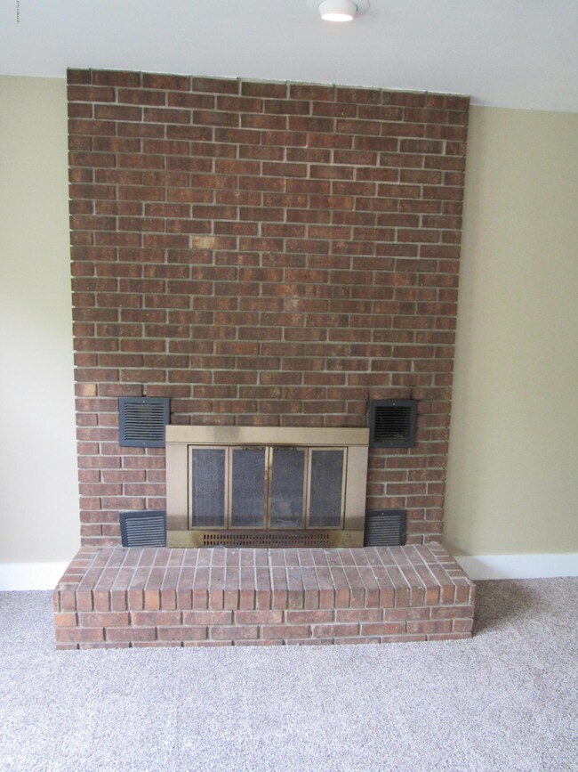Brick fireplace in living room