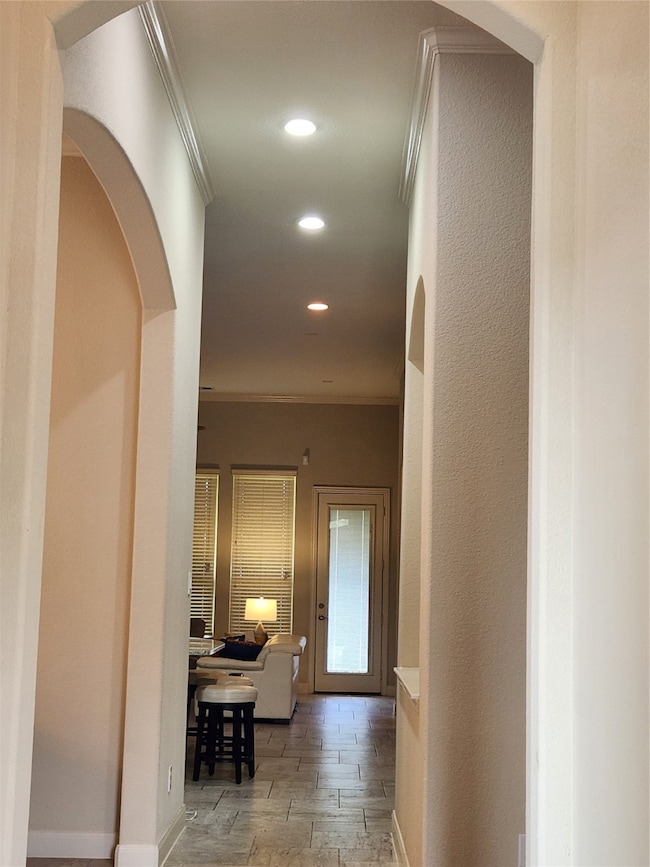 Step into this elegant one-story with sky-high cei